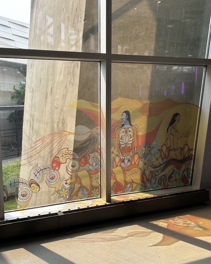 Elements of the mural titled Kiinwin Dabaadjmowin, or “Our Story” as window clings at the CN Tower