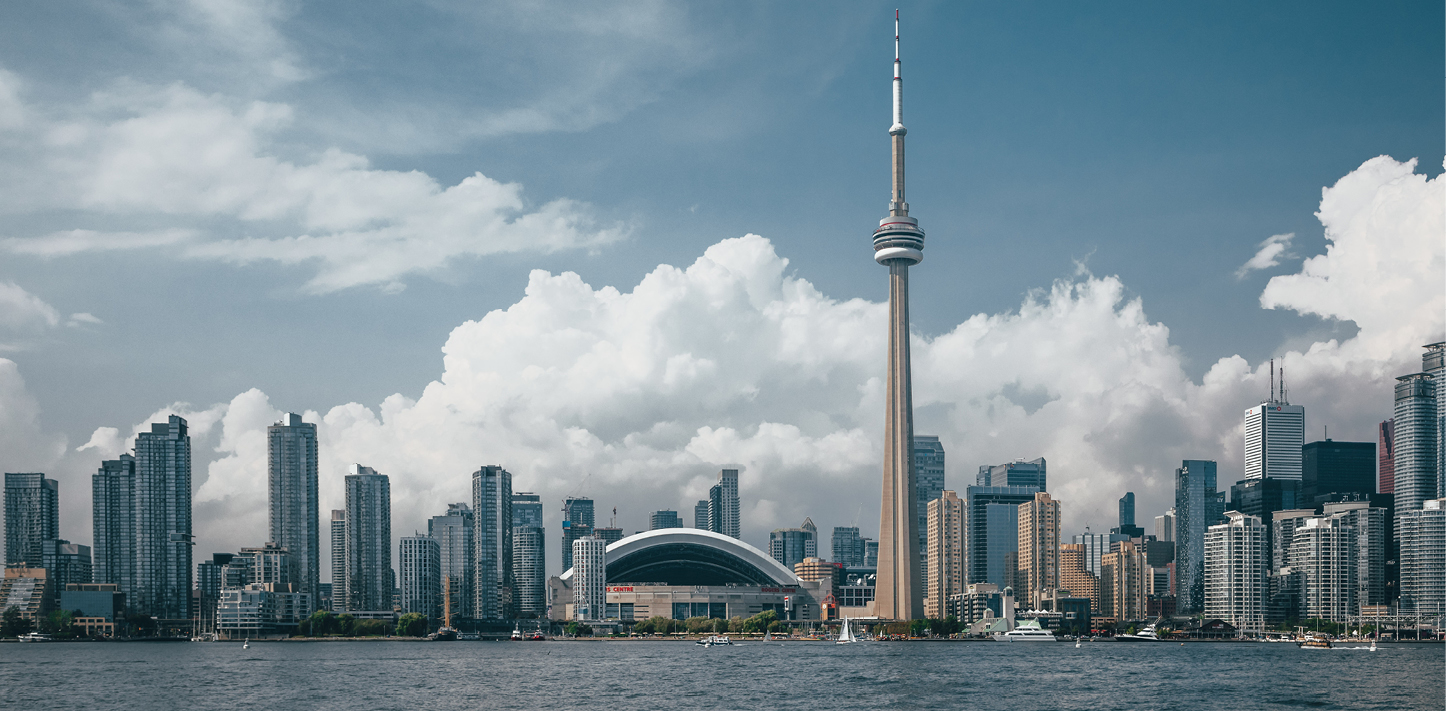 Toronto CityScape with clouds in the background and blue sky in the front