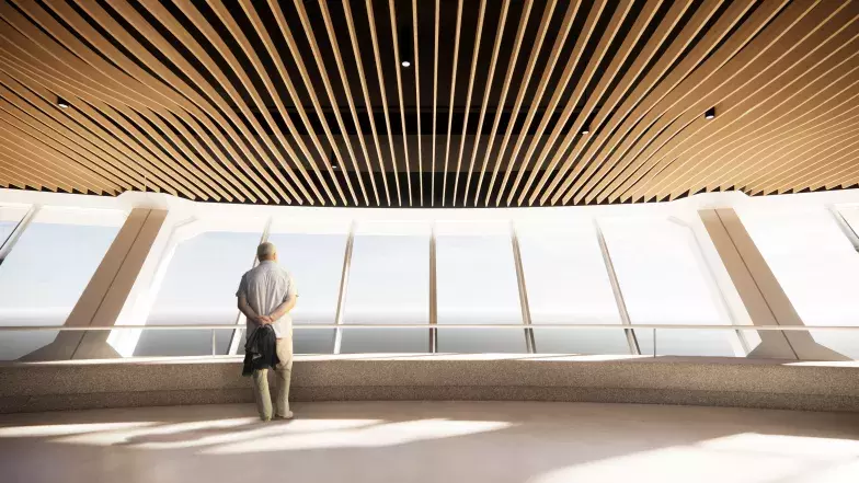 man standing at window of level 2