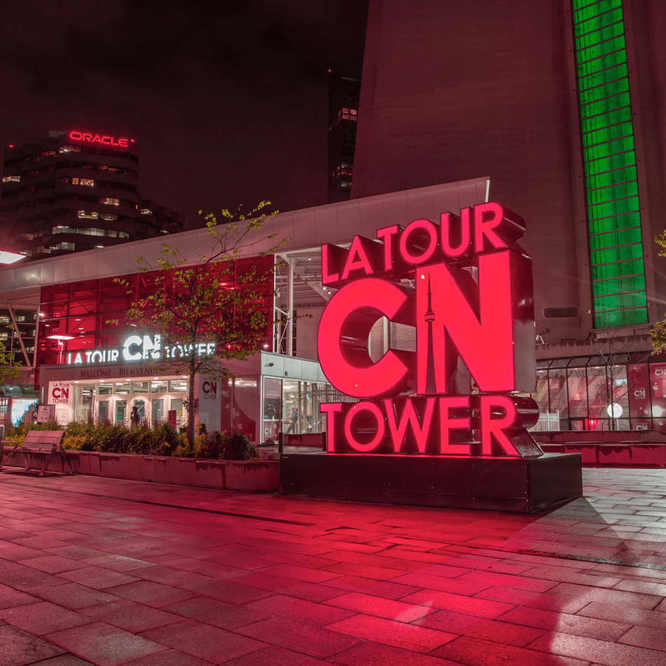 The CN Tower sign outside, at the base of the tower